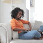 Woman taking virtual Apple training at home during the lockdown - the ideal time to upskill.