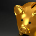 Influential NewDay .net development open banking solution wins quality award - illustrated by golden piggy bank