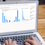 Laptop with microsoft emissions impact dashboard screen