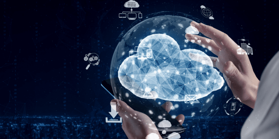 Person holding a virtual cloud network within their hands to represent cloud adoption trends