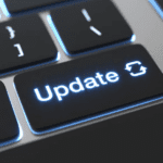 Update button on a laptop keyboard to represent software modernisation